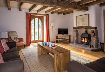 Head to the sitting-room and cosy up in front of the glowing wood-burner after a full day of activity, bliss!