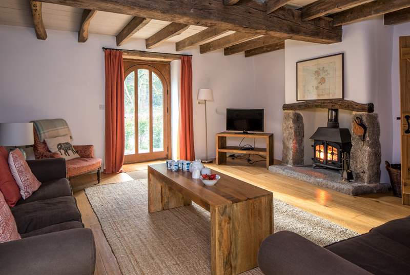 Head to the sitting-room and cosy up in front of the glowing wood-burner after a full day of activity, bliss!