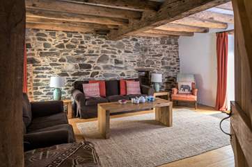 What a delightful sitting-room with plenty comfy seating for all.