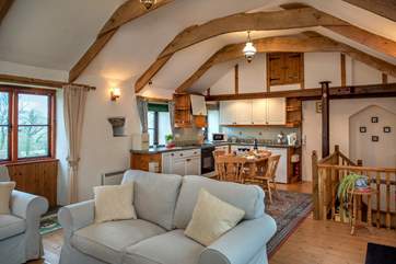 The open plan living-room is on the first floor giving a bird's-eye view of the surrounding countryside.