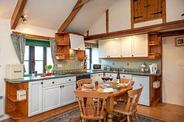 The kitchen/dining area perfect for serving up those holiday fry-ups.