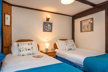 The pretty twin-bedded room.