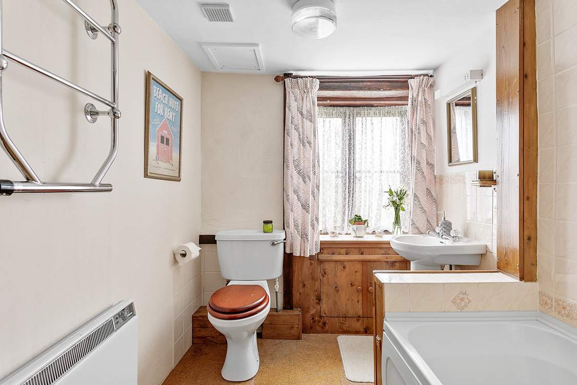 The family bathroom is on the ground floor with a shower attachment for a quick morning shower.