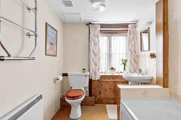 The family bathroom is on the ground floor with a shower attachment for a quick morning shower.