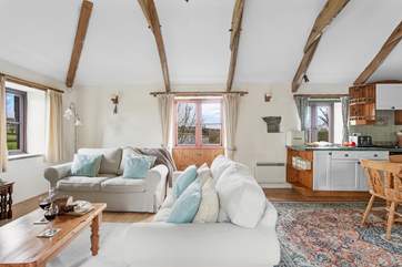 Countryside views from every angle in the living area.