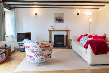 The open plan living area offers the perfect spot to enjoy a lazy morning.