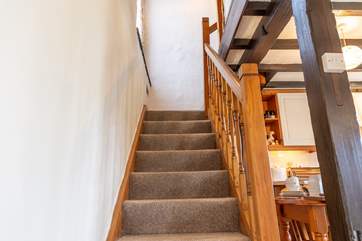 The stairs up to the first floor.