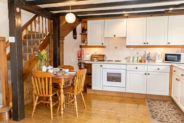 The kitchen is well-equipped and has ample storage space.