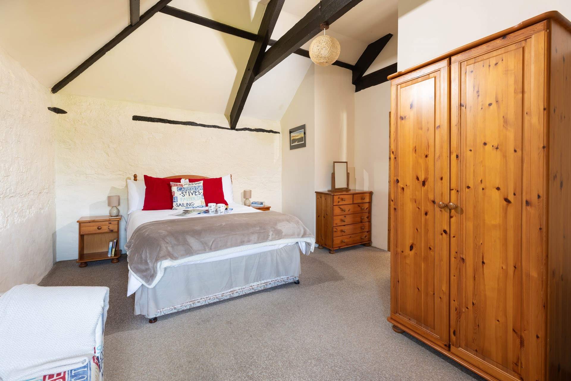 Enjoy a dreamy sleep in the gorgeous vaulted ceiling bedroom.
