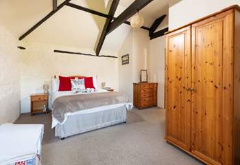 Enjoy a dreamy sleep in the gorgeous vaulted ceiling bedroom.