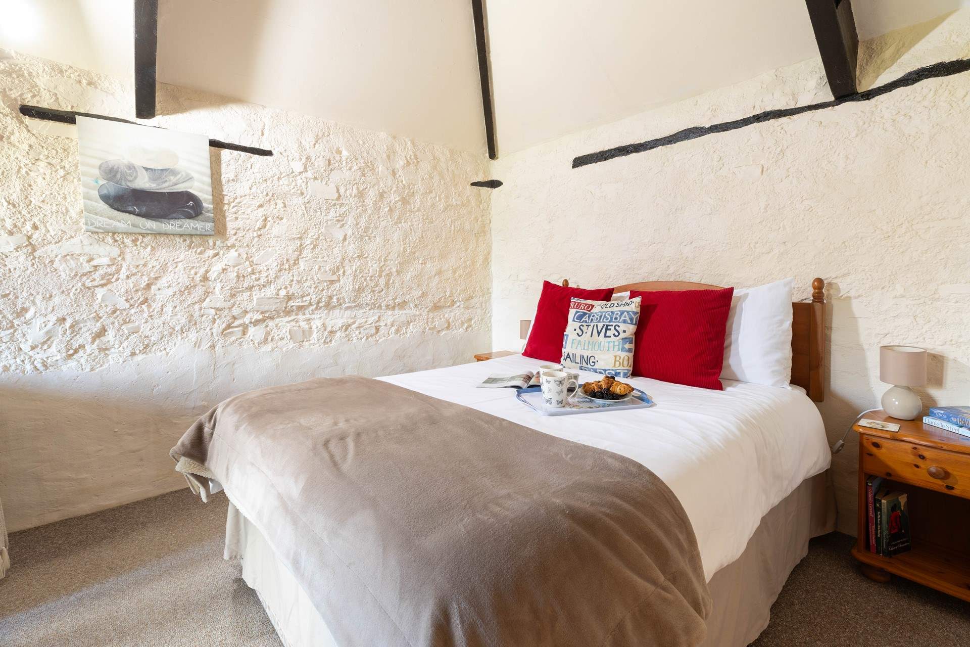 The bedroom offers a comfortable space to recharge.