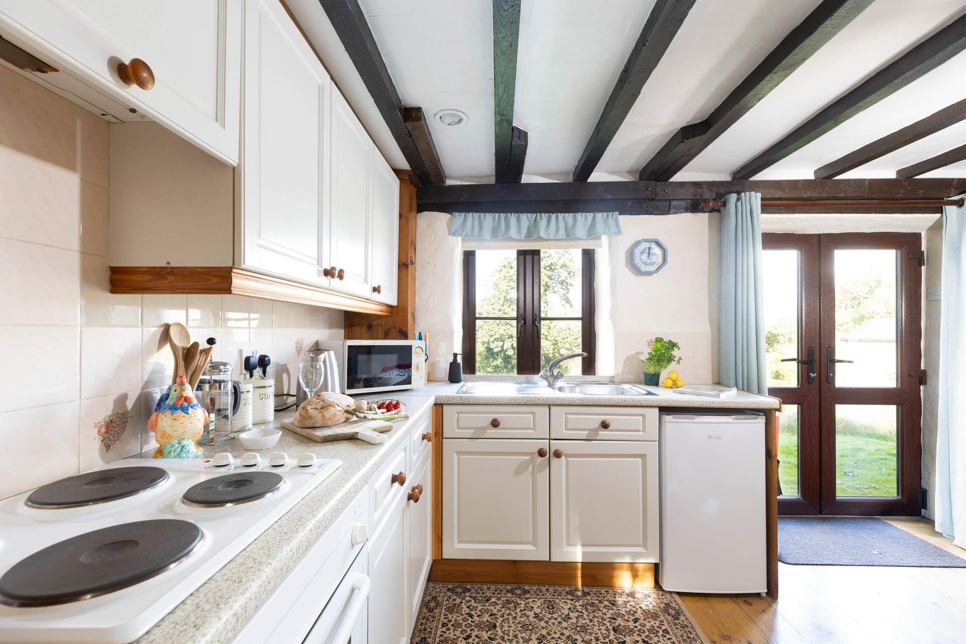 The kitchen is well-equipped and has ample storage space.