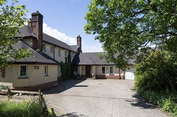 The courtyard provides plentiful private parking.