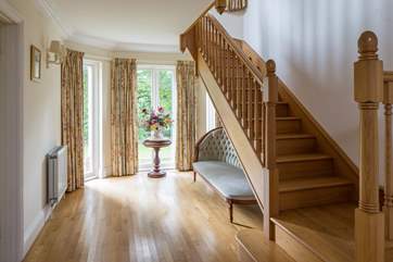 The stairs lead off this grand hallway. The hallway is a splendid area in its own right.