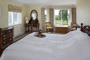 Bedroom 2 boasts the most breathtaking views out over these stunning grounds.