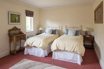 Spacious twin room which is right next door to the family bathroom.