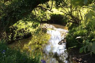 This beautiful river borders the grounds (please take care with children). The owner has placed benches throughout the paths around the grounds to make stopping and enjoying this spot a pleasure
