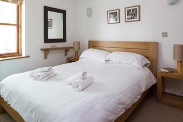 Bedroom 1 with en suite and TV.