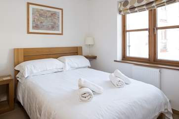 Bedroom 2 with views into the heart of Brixham.