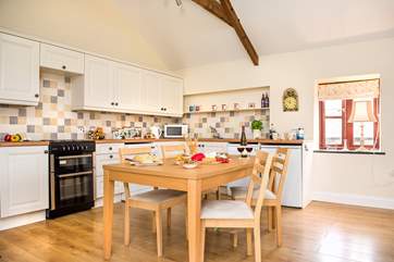 The kitchen and dining-areas.