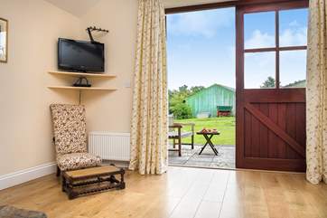The large double doors lead out to the patio-area.