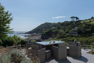 Could there be a better place for meals and evening drinks? Please take care with the low-level balustrade around the decking-area.