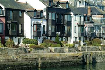 The Pierhouse is the ground and first floor with only one other apartment above; it is the right-hand half of the large black-timbered property.