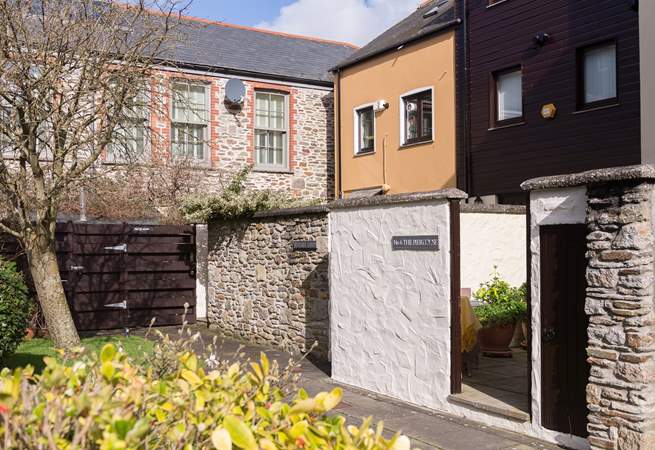 High walls give the rear courtyard ample privacy.