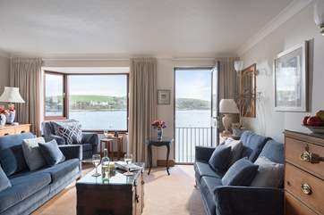 The sitting-room is lovely and light and makes the most of the outlook.