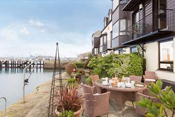 The waterside terrace is ideal for breakfast.