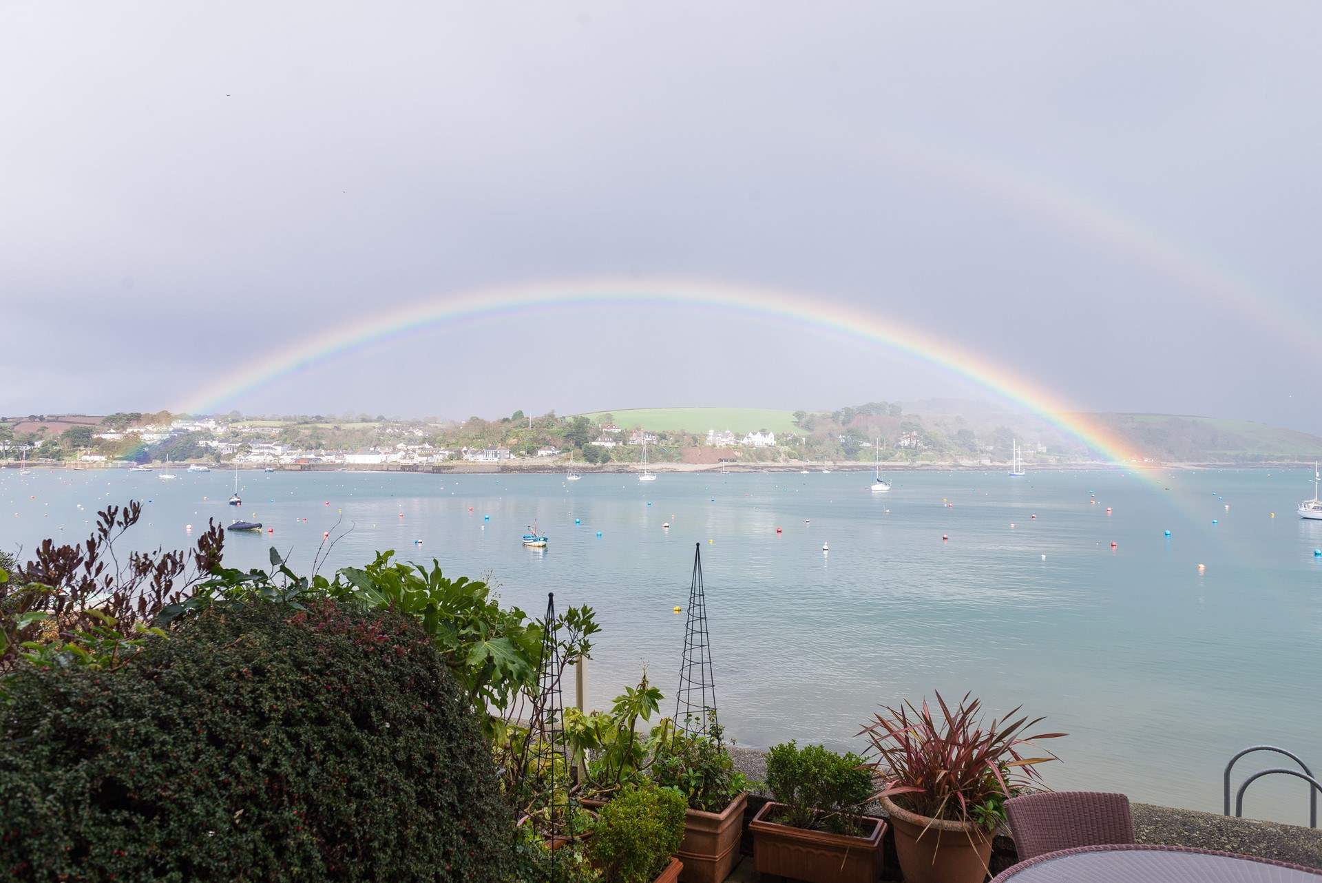 You might be lucky enough to see such an amazing rainbow across the bay!