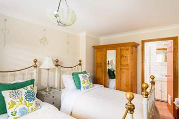 The twin bedroom on the ground floor has an en suite shower-room.