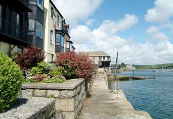 Please take care as the patio opens straight onto the unfenced quay. 