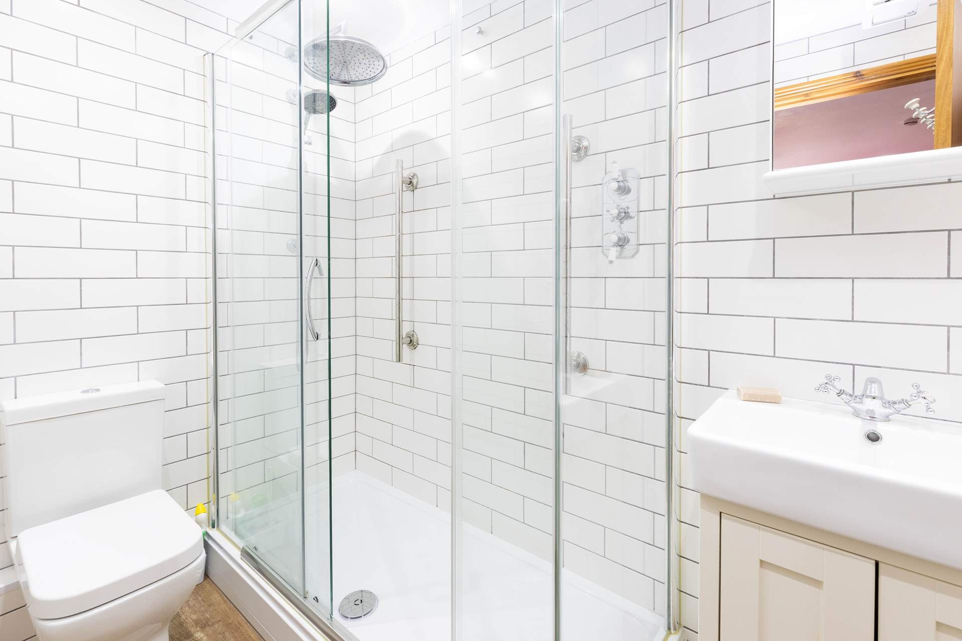 Both bedrooms have en suite shower-rooms. 