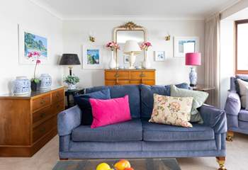Pops of colour and beautiful paintings throughout. 