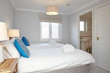 Like the entire apartment, the master bedroom is bright and inviting.