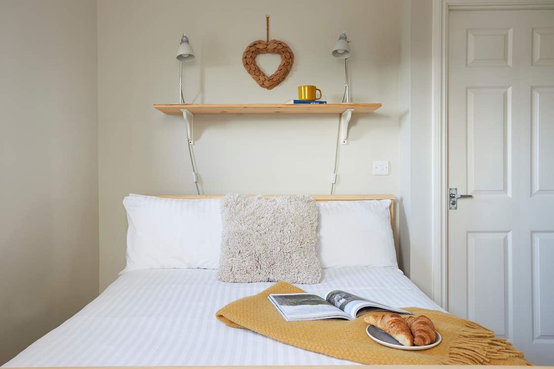 Cosy morning moments with fresh croissants and a good read in bed.