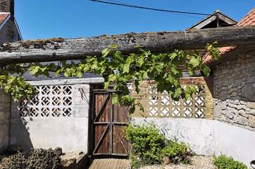 Part of the enclosed courtyard leading out to the farmyard.