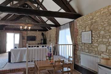 The barn has vaulted ceilings with original beams.