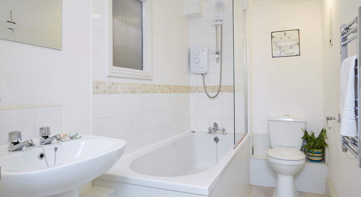 Modern bathroom with fitted shower.