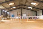 The nearby barn is used by the owners for dog agility training.
