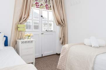 The bedroom doors open out onto the decking.