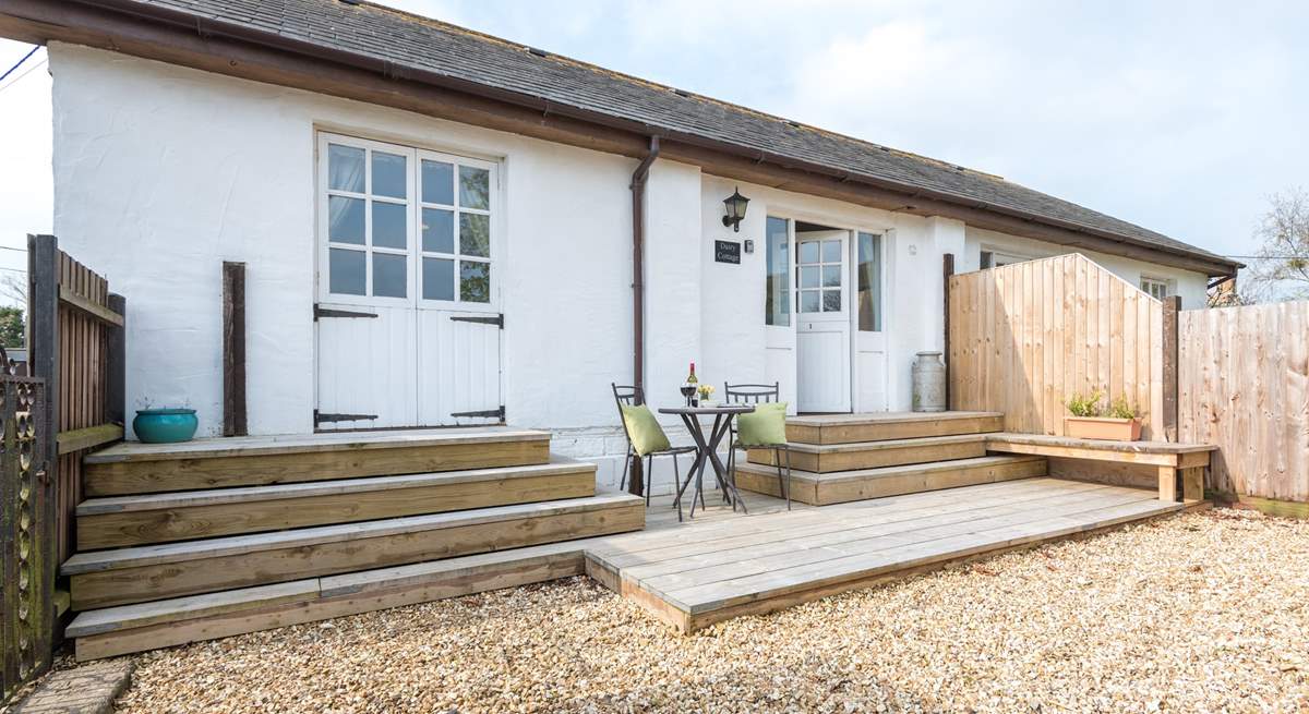 The enclosed patio-area is ideal for outdoor dining.