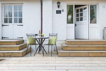 The doors from the sitting-room and the master bedroom open up onto the decking.