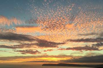 Enjoy fantastic sunsets from the comfort of your chair, or take a glass of something nice outside.