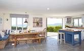 A lovely large space in which to entertain, with light flooding in and stunning views of the white cliffs of Freshwater. - Thumbnail Image