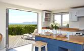 Open up the bi-fold doors, let the summer air in and enjoy a spot of lunch looking out across the sea, towards the white cliffs of Freshwater. - Thumbnail Image