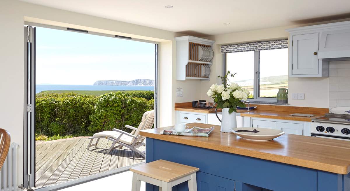 Open up the bi-fold doors, let the summer air in and enjoy a spot of lunch looking out across the sea, towards the white cliffs of Freshwater.