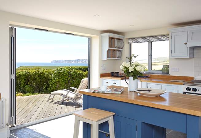 Open up the bi-fold doors, let the summer air in and enjoy a spot of lunch looking out across the sea, towards the white cliffs of Freshwater.