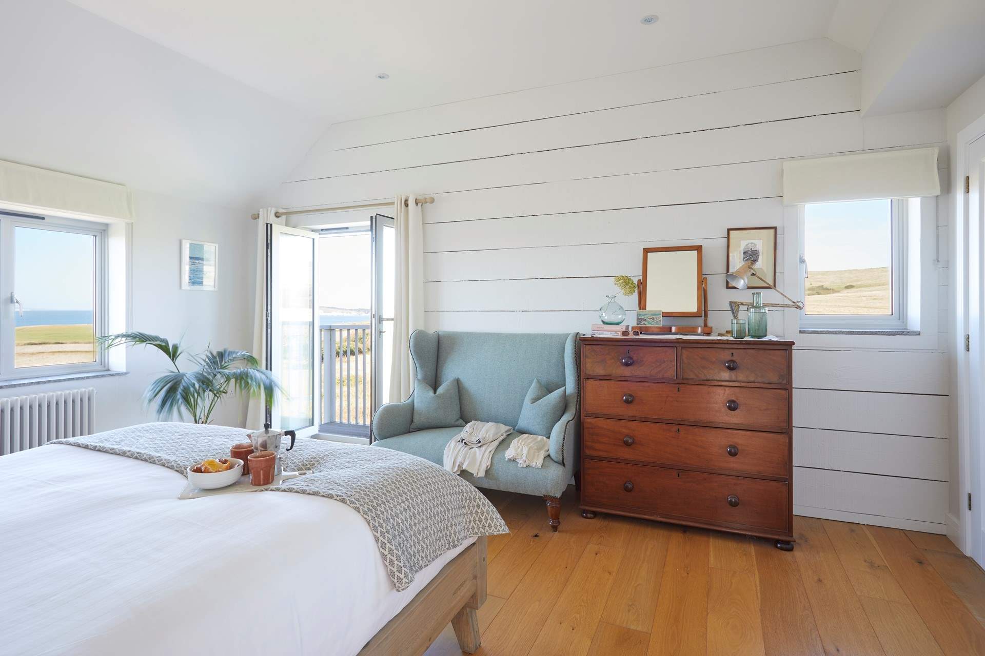 Bedroom 1 boasts panoramic views features its very own balcony.